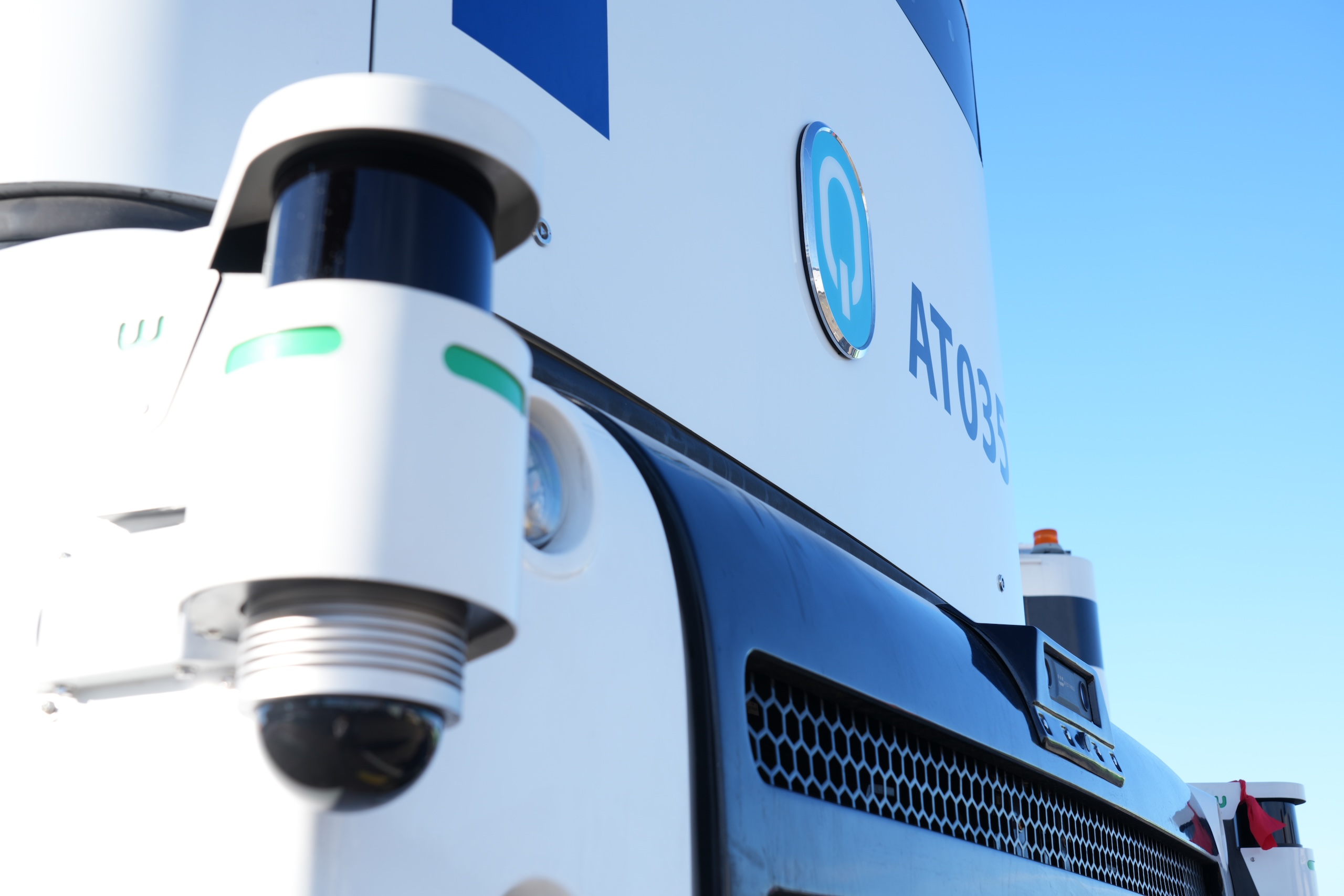 Close-up of the front of Westwell Q-Truck, showing the camera and sensors for autonomous driving.